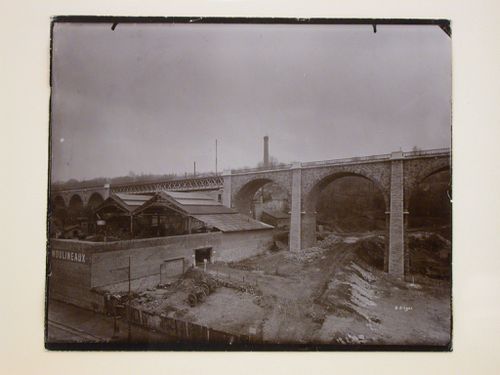 Partial view of a viaduct crossing over a factory, France ?