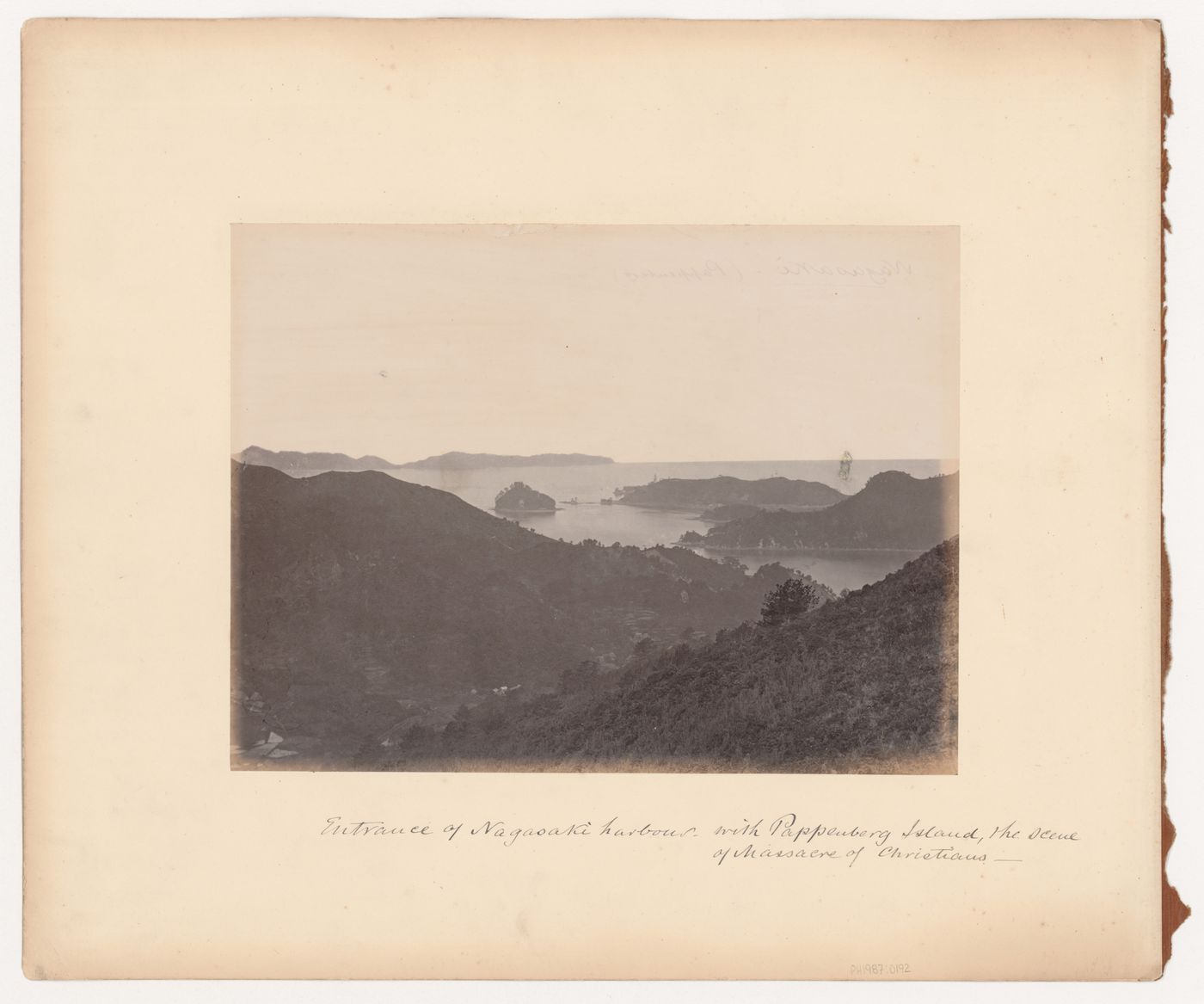 View of Takaboko Island (also known as Pappenberg Island) and the coastline near Nagasaki, Japan