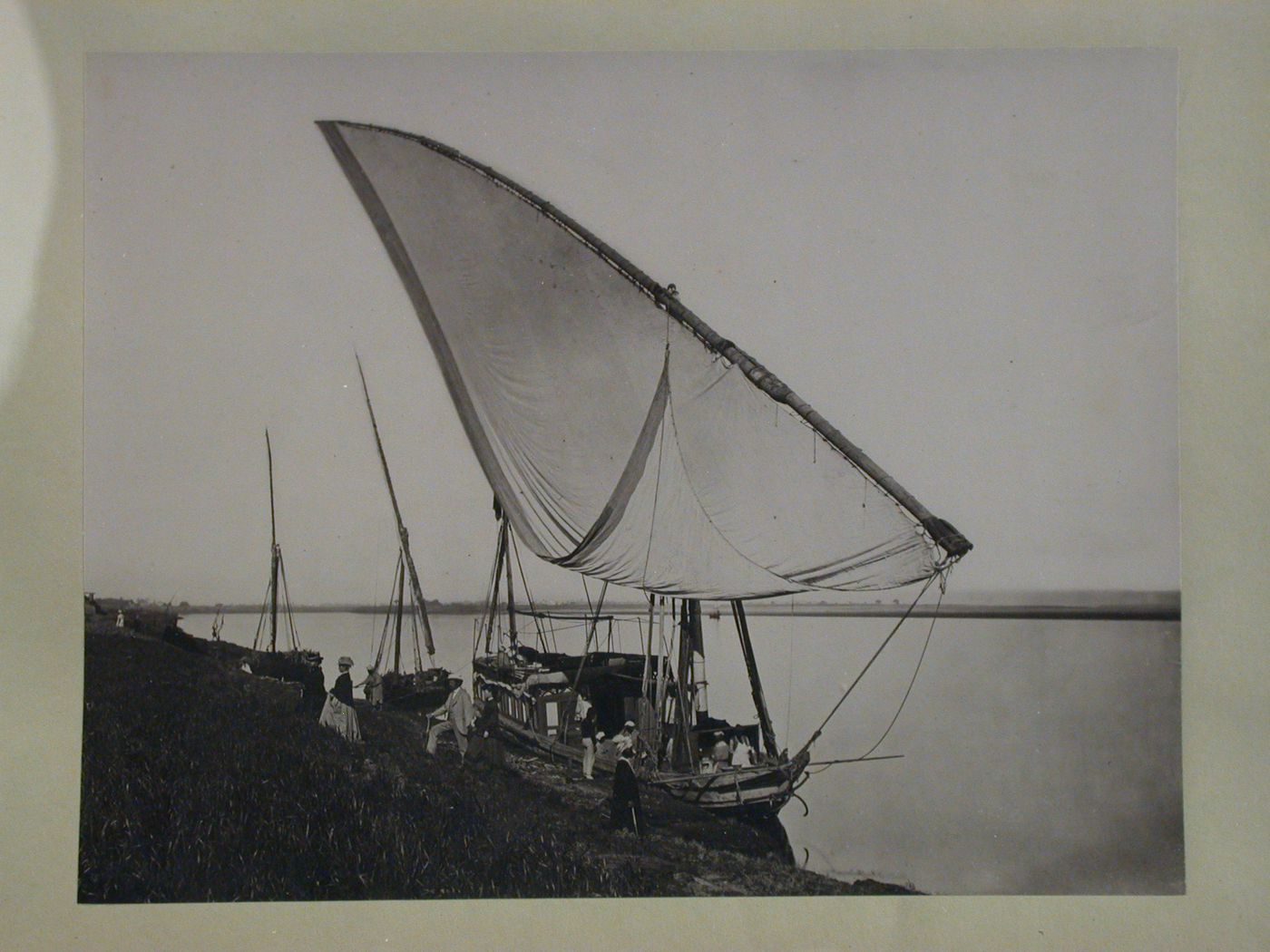 View along Nile, showing good's in a dhahabiyah (Egyptian small boat), Egypt