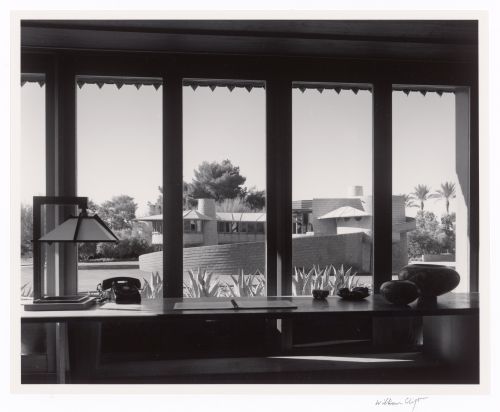 Main house seen through guest house windows, from the series The David and Gladys Wright House