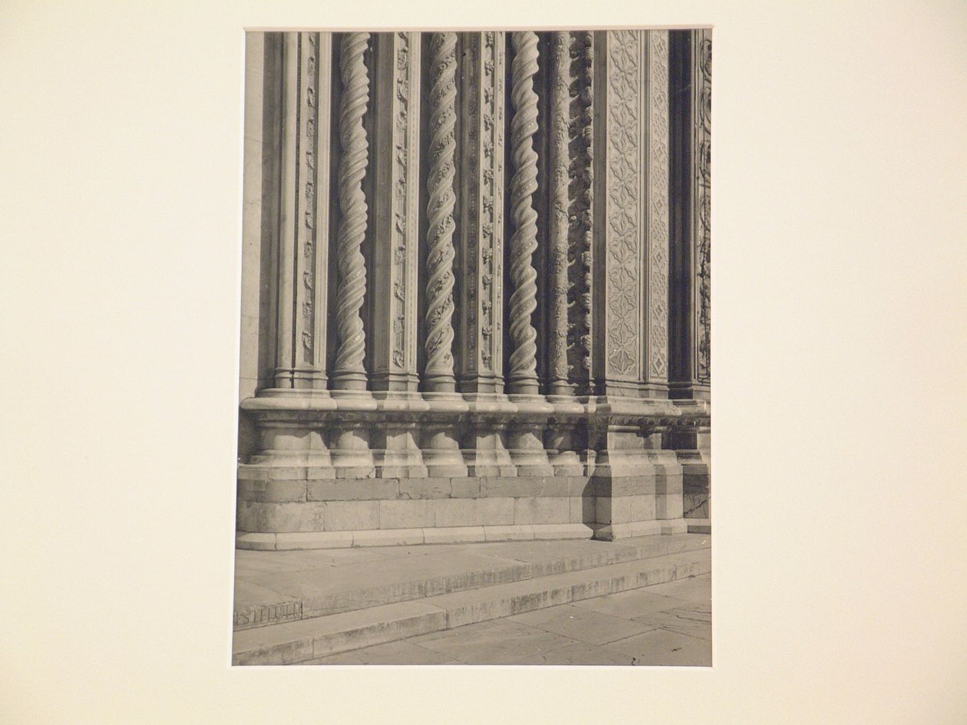 Detail; elaborately carved colonettes and bases probably on exterior of cathedral