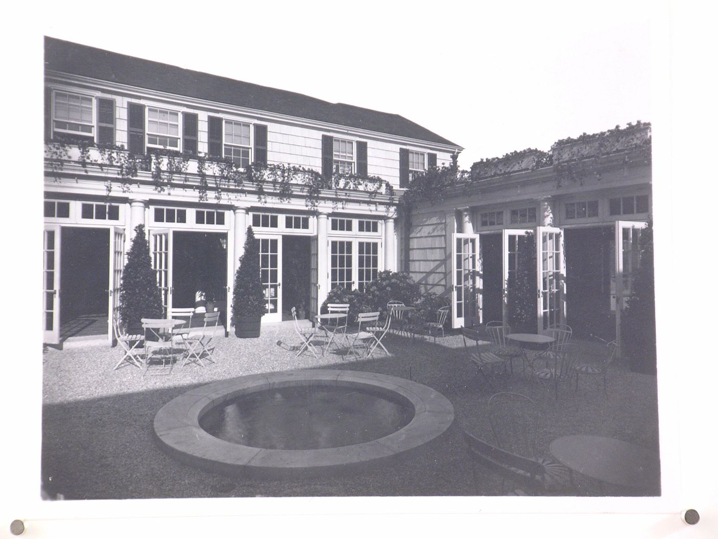 View of the rear façade of the Oakland Hills Country Clubhouse showing a terrace, 3951 West Maple Road, Bloomfield Township, Michigan