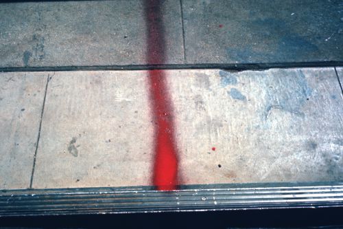 Photograph of line on ground  for performance of Red Line