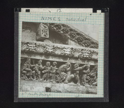 Detail view of frieze of cathedral facade with relief sculpture, Nîmes, France