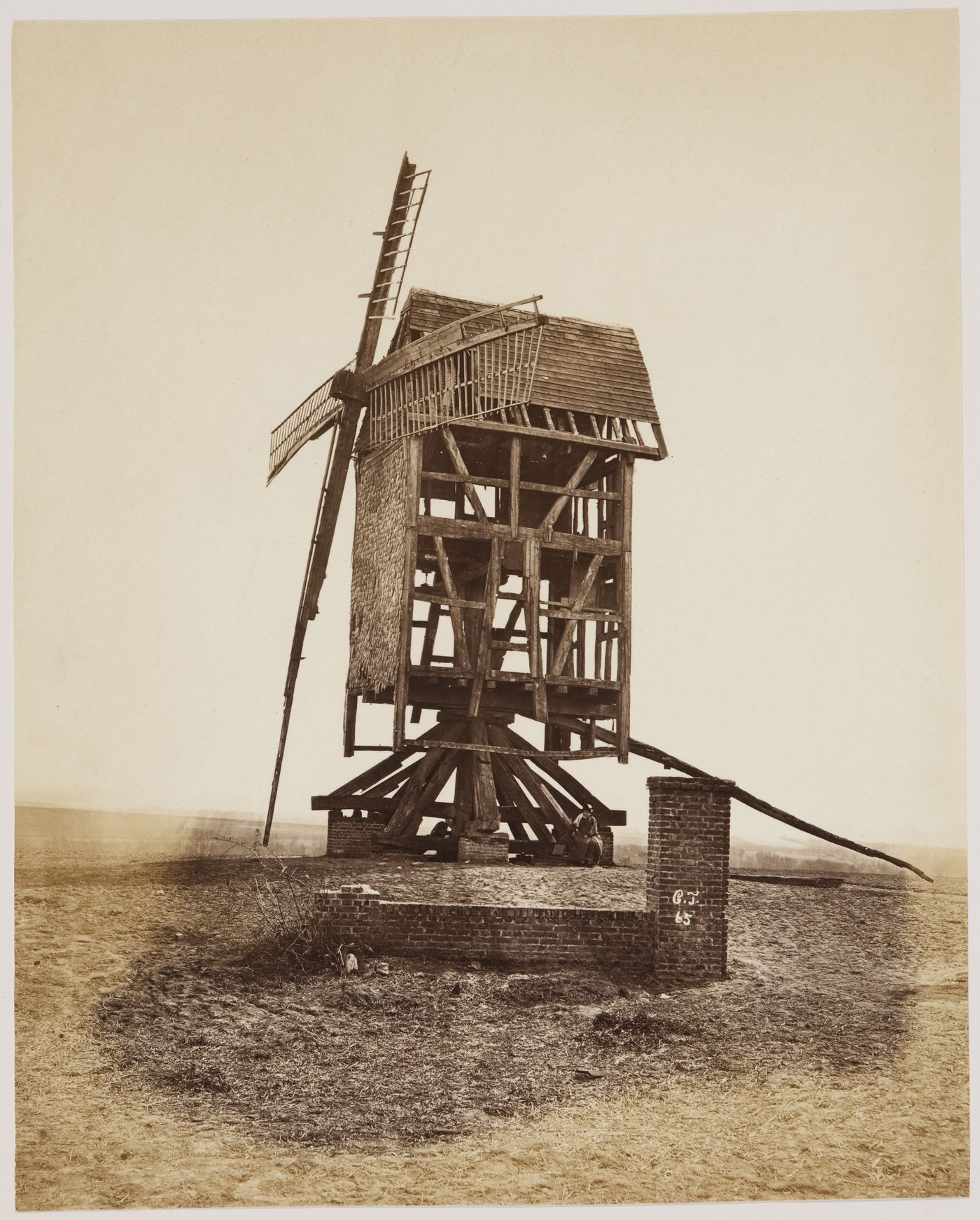 View of a windmill and a soldier after the Paris Commune uprising of 1871, St. Quentin [?], France