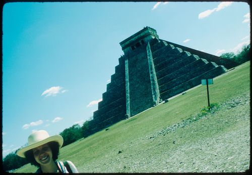 Woman near the "El Castillo" pyramid, Chichen Itza, Mexico
