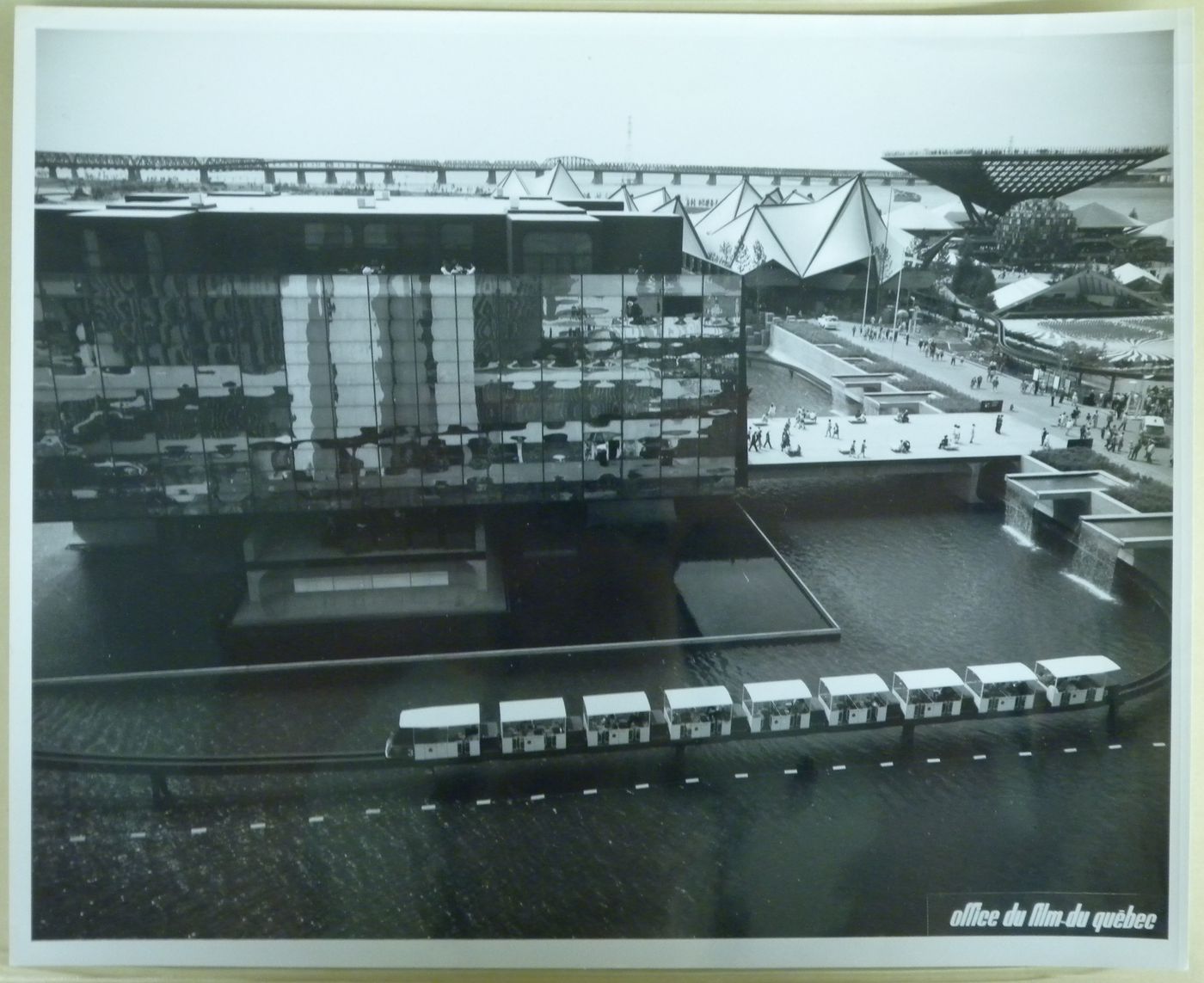 View of the Province of Quebec, Ontario, Canada's Pavilions with the minirail in foreground, Expo 67, Montréal, Québec