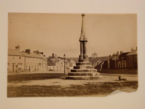 View of the lower section of the Market Cross, Norham, Northumberland, England