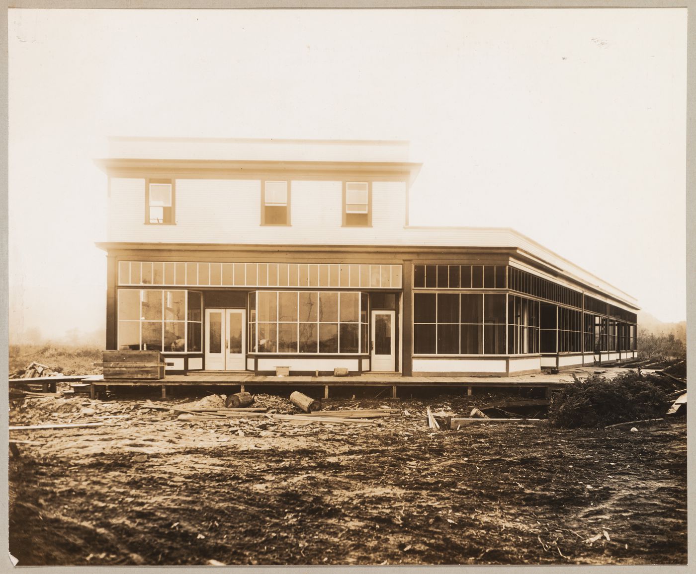 View of a commercial building under construction, corner of Broadway and Kingsway, Coquitlam (now Port Coquitlam), British Columbia