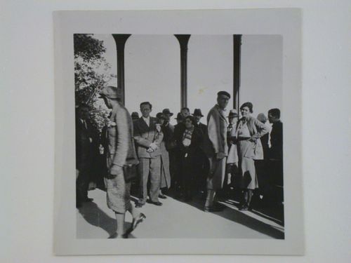 Group portrait of study tour members in a garden pavilion