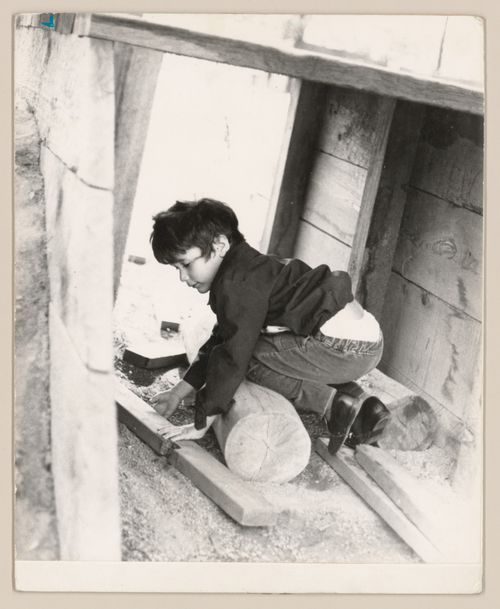 View of child playing in Talmud Torah School Playground, Vancouver, British Columbia
