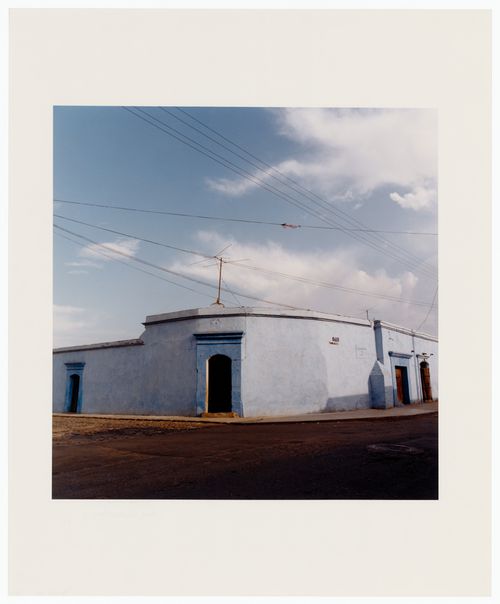 View of an unidentified one storey building on a street corner, calle de Tinoco y Palacios, Oaxaca, Mexico