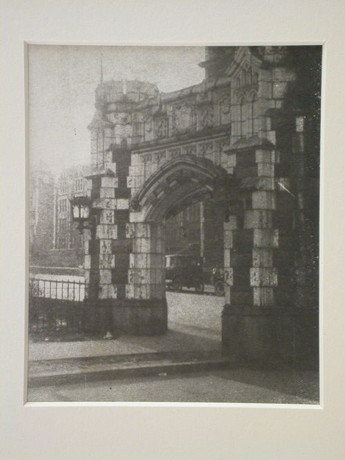 View looking through stone arched gateway to street, New York City, New York