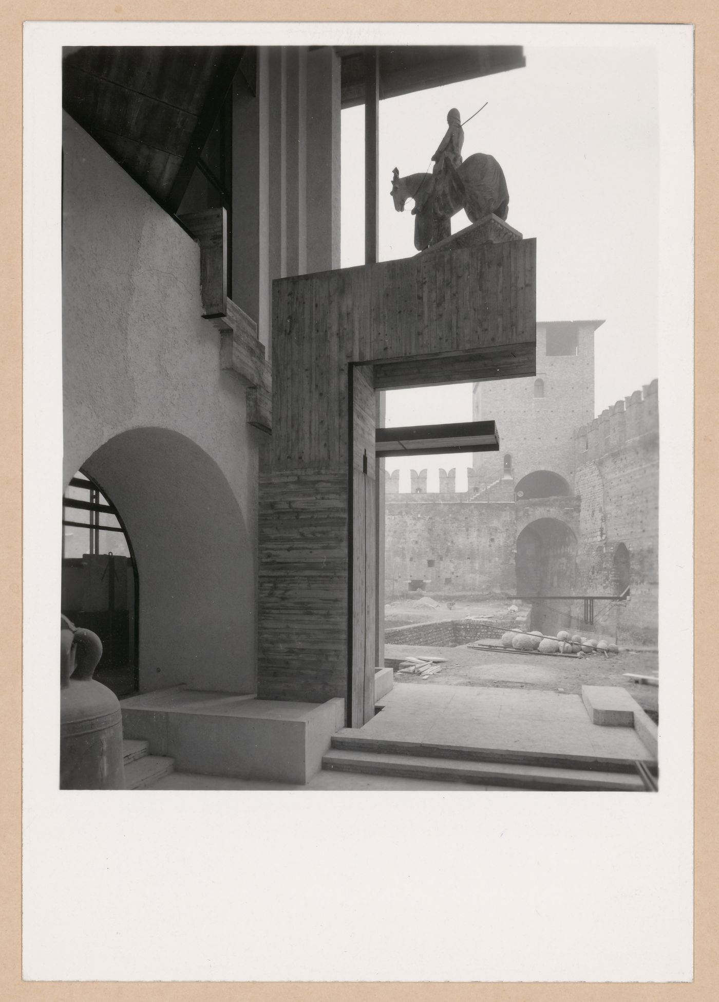 View of the Can Grande della Scala Statue with the moat and a tower in the background, from the ground floor, Museo di Castelvecchio, Verona, Italy