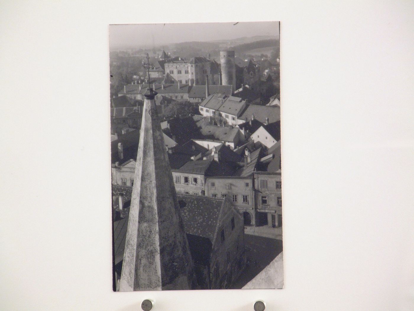 View from a church tower with spire in the foreground, castle in the background, Prague [?], Czech Republic