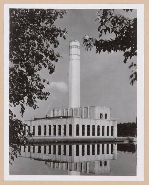 View of the principal and lateral façades of the Power House for the Engineering Laboratory from across a river [?], Rouge River Plant, Ford Motor Company, Dearborn, Michigan