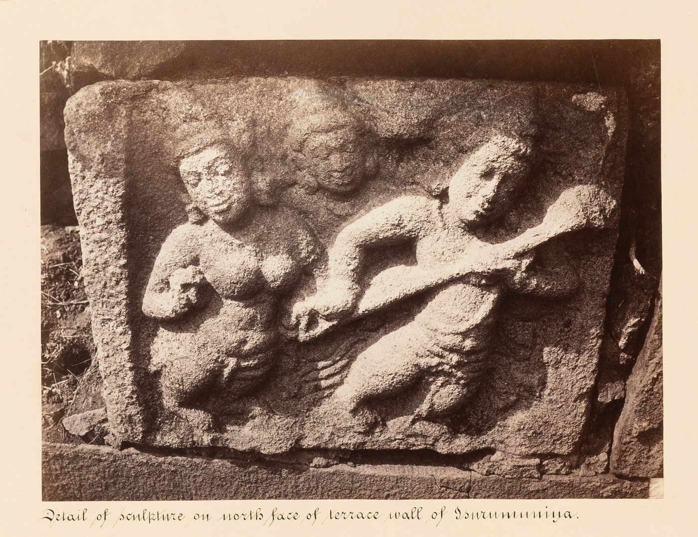 Close-up view of a relief on the north façade of the terrace wall, Isurumuniya Temple, Anuradhapura, Ceylon (now Sri Lanka)