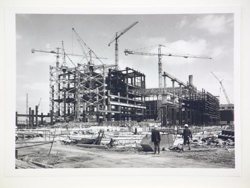View of cranes and construction of steel structure for power station, from exterior, United Kingdom