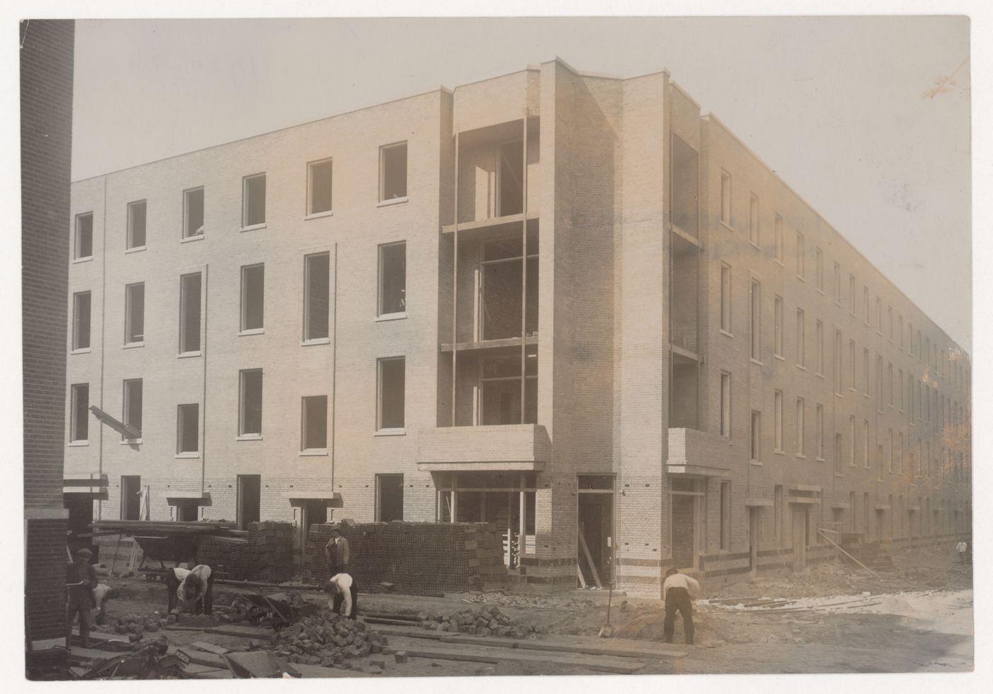 Exterior view of Tusschendijken Housing Estate under construction, Rotterdam, Netherlands