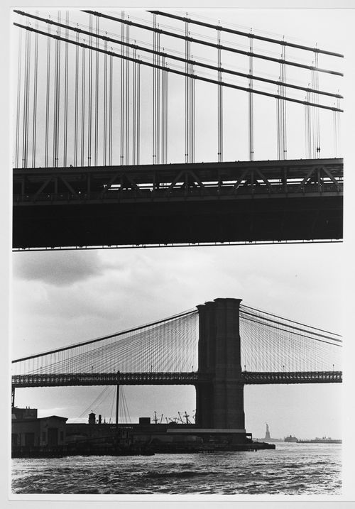 Partial views of the Manhattan and Brooklyn bridges with the Statue of Liberty in the background, New York City, New York