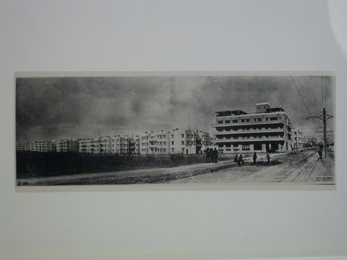 View of a street with housing in the background and a dormitory in the foreground, Armenikend (Shaumian) settlement, Baku, Soviet Union (now in Azerbaijan)