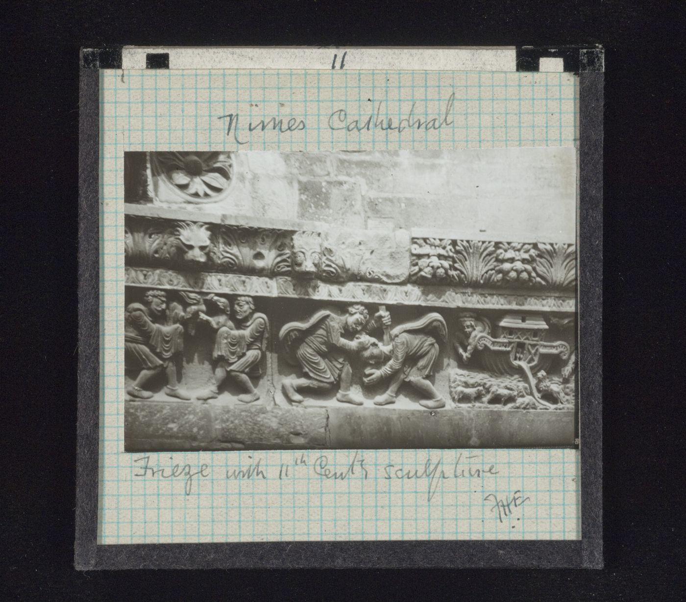 Detail view of frieze of cathedral facade with relief sculpture, Nîmes, France
