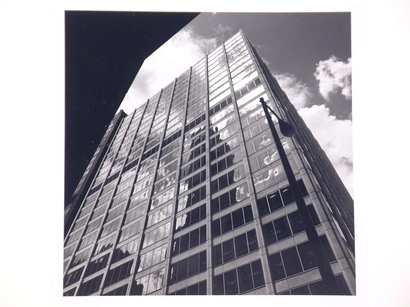 Worm's eye view of the tower façade and corner of the 200 West Monroe Building, Chicago, Illinois, United States