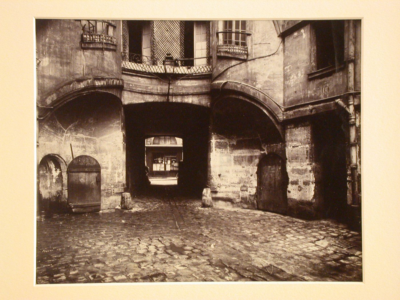 Courtyard side of Cartault's dragon portal, showing two stair turrets, Paris, France