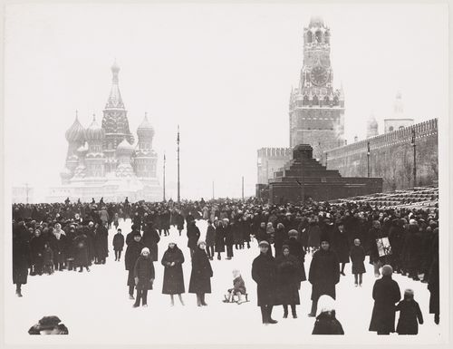 View of Red Square in winter with Saint Basil Cathedral, the Spasskaia Tower and the second wooden Lenin Mausoleum in the background, Moscow