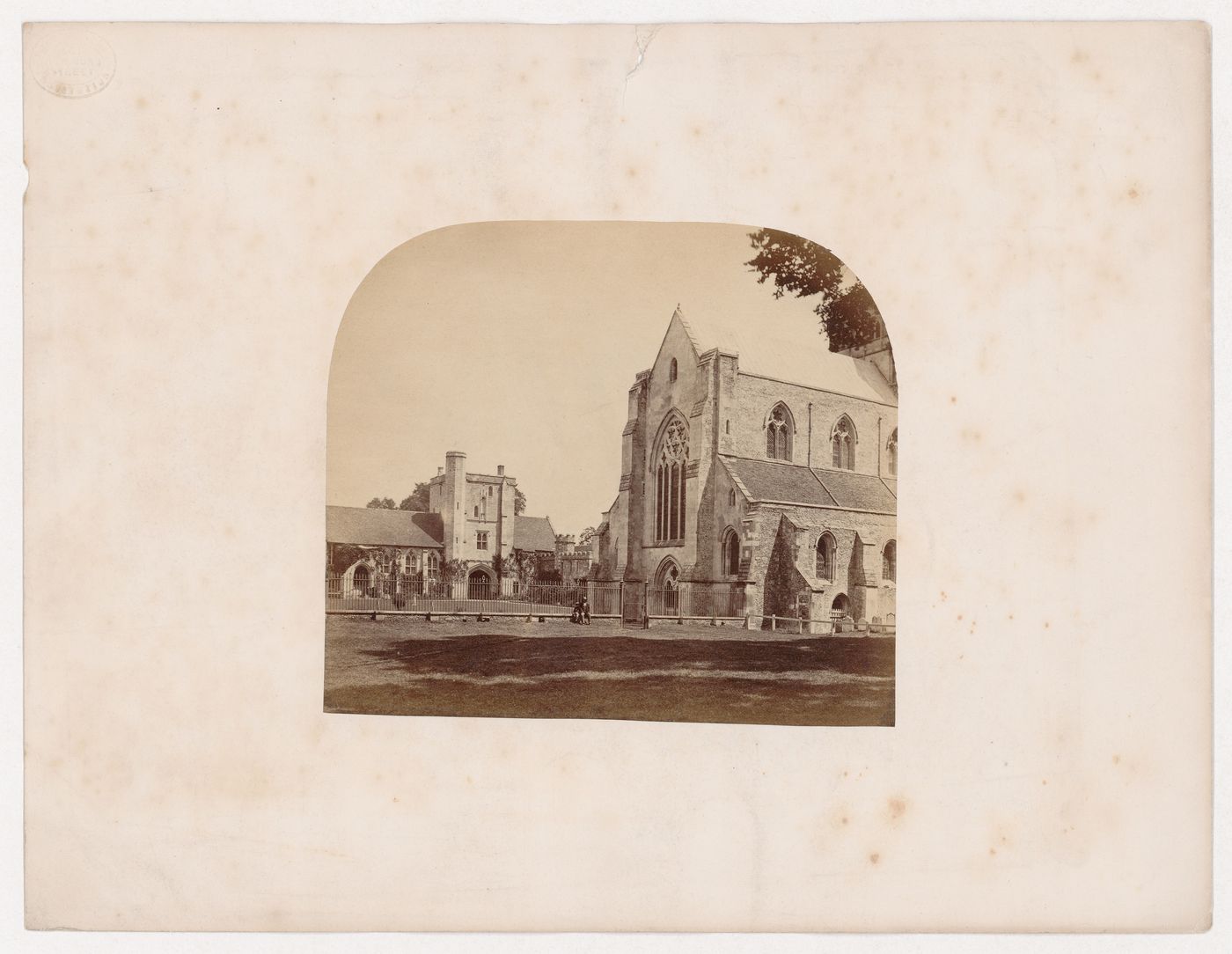 Partial view of St. Cross Church showing the nave and partial view of the hospital of St. Cross, Winchester, Hampshire, England