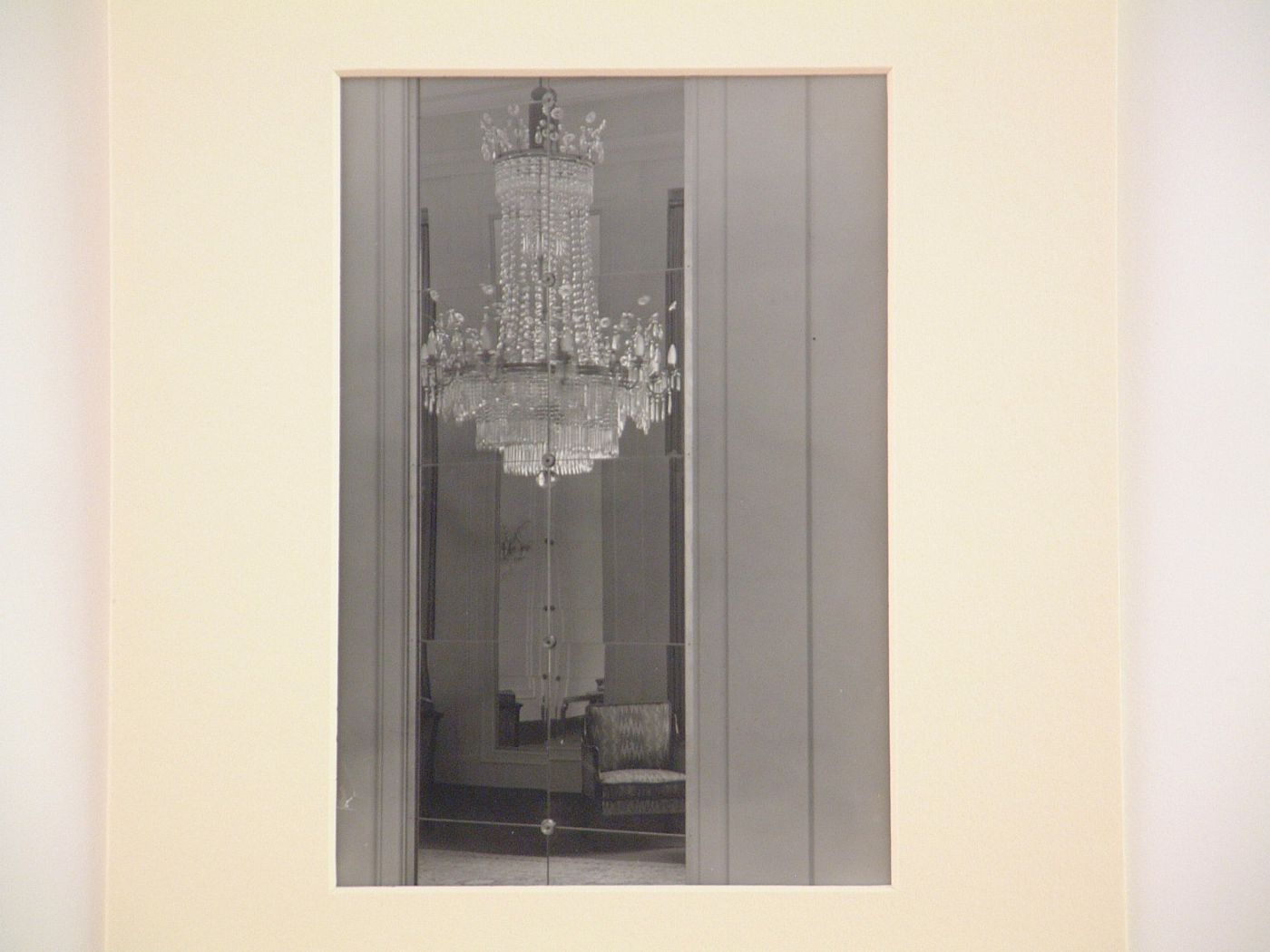 Detail of chandelier reflected in mirror