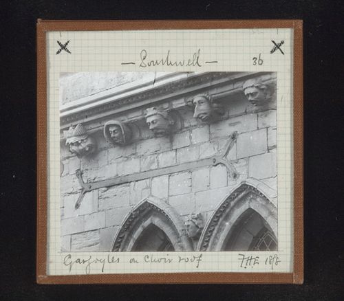 Detail view of sculptures of grotesque heads on choir roof, Southwell Minster, Southwell, Nottinghamshire, England