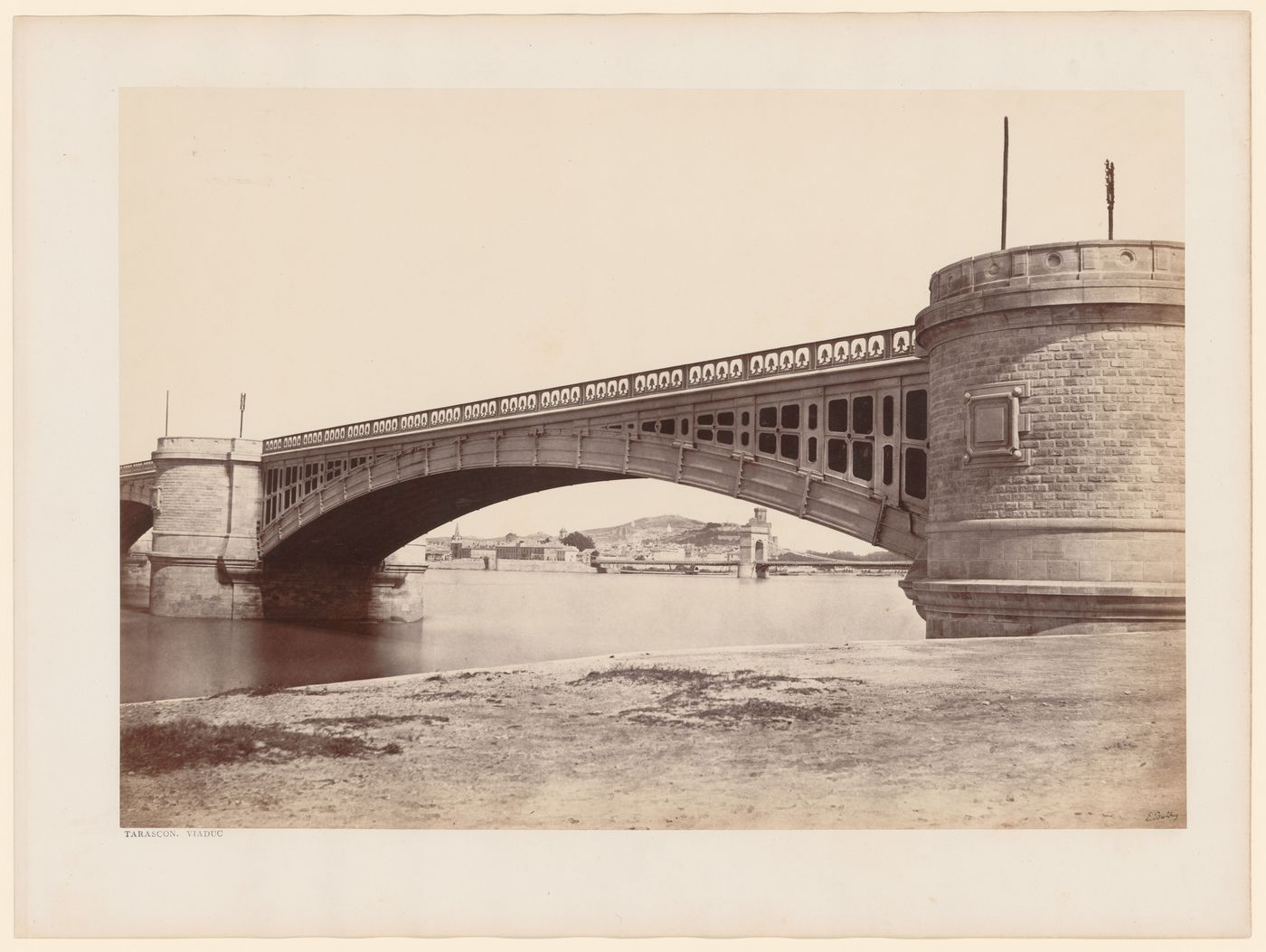 View of the viaduct, with suspension bridge castle, and city visible in distance, Tarascon, France