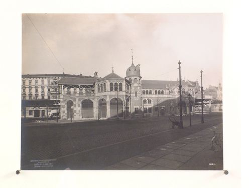 View of a building façade connecting to the elevated railway system