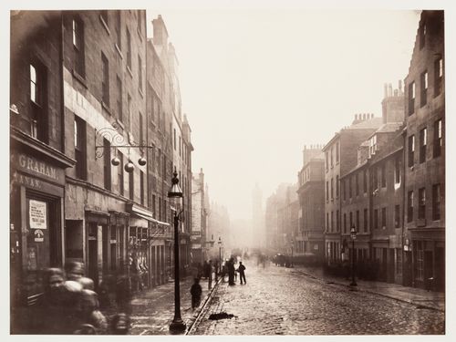View of High Street from College Open showing commercial buildings including a pawnshop and a butcher shop, Glasgow, Scotland