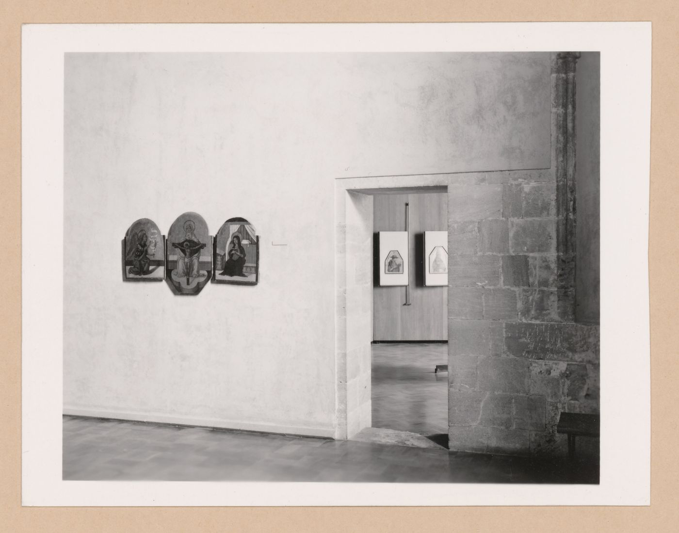 Interior view of a gallery showing a triptych painting, a doorway and another gallery, Palazzo Abatellis, Galleria regionale della Sicilia, Palermo, Italy
