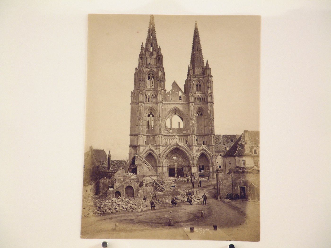 View of the Abbaye de St Jean des Vignes showing soldiers and other buildings after the Paris Commune uprising of 1871, Soissons, France