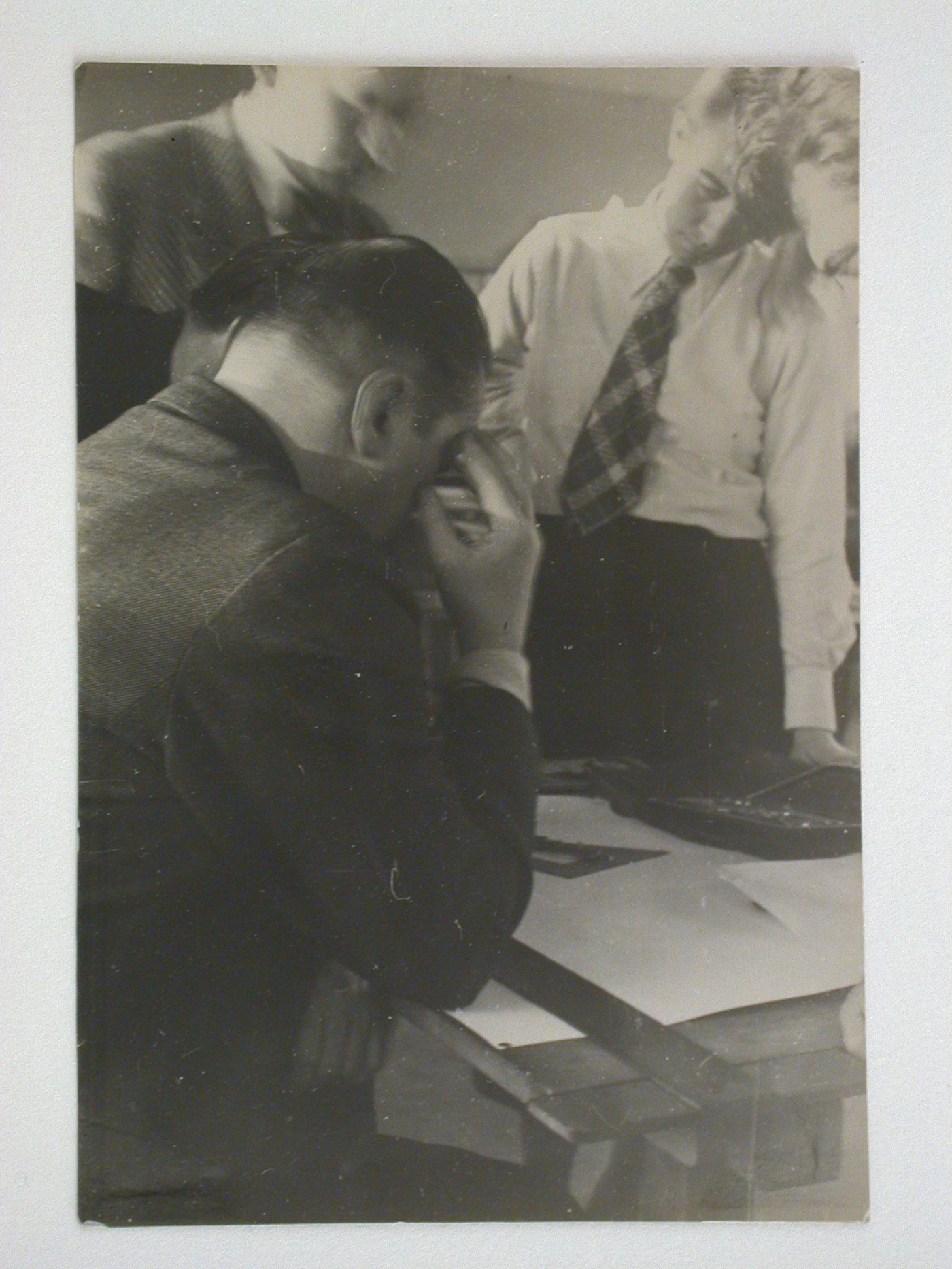 Mies van der Rohe conducting a seminar at the Bauhaus with Herman Klumpp and two other students, Dessau, Germany