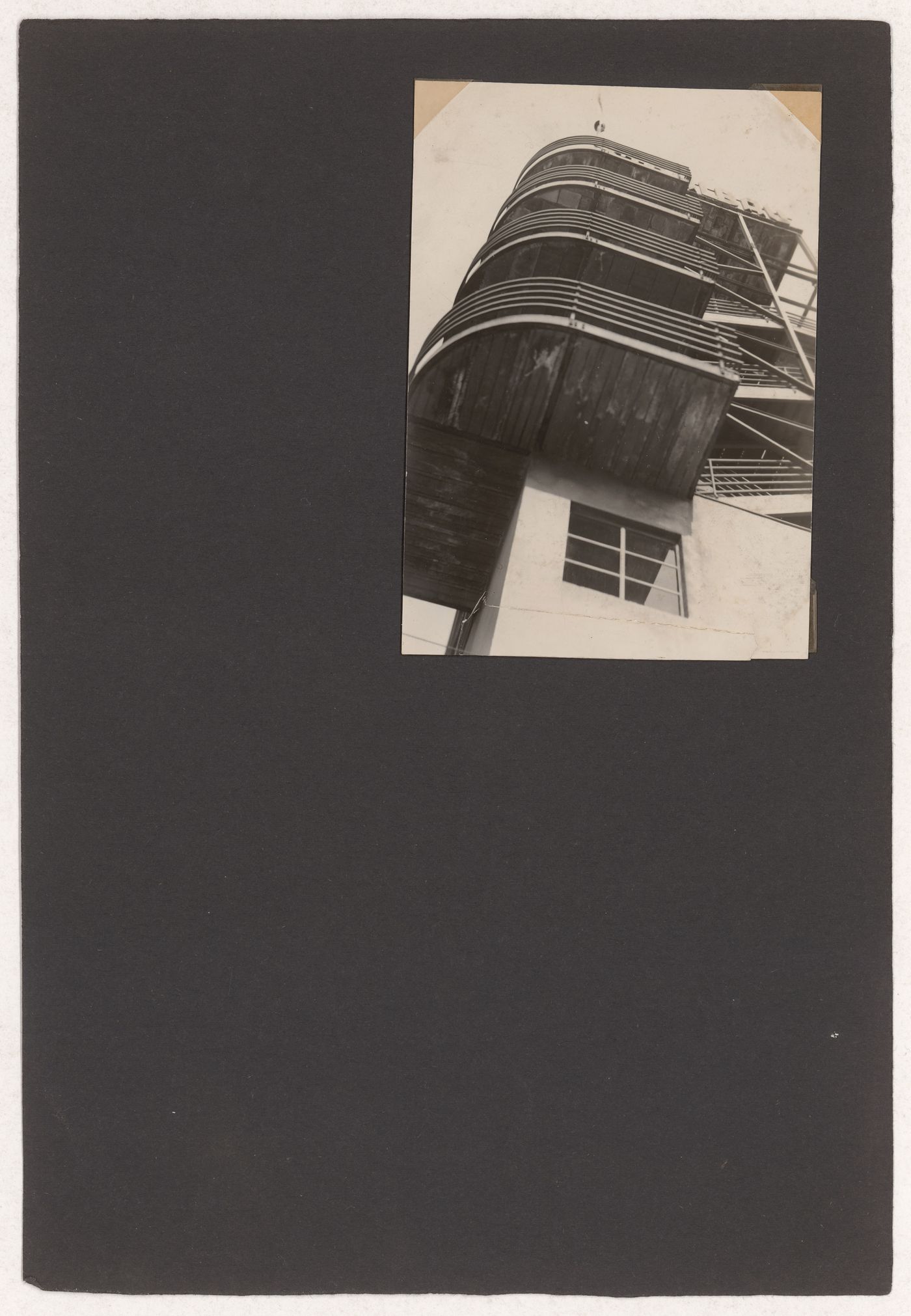 Worm's-eye view of an unidentified building showing a balcony, possibly in Germany