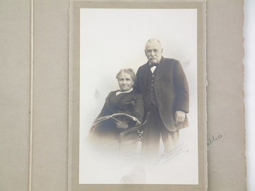 Studio portrait of a man, aged 80, and a woman, aged 78