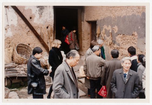 Participants of the "Rural Housing: A First Step to Market Housing" international workshop during site visit