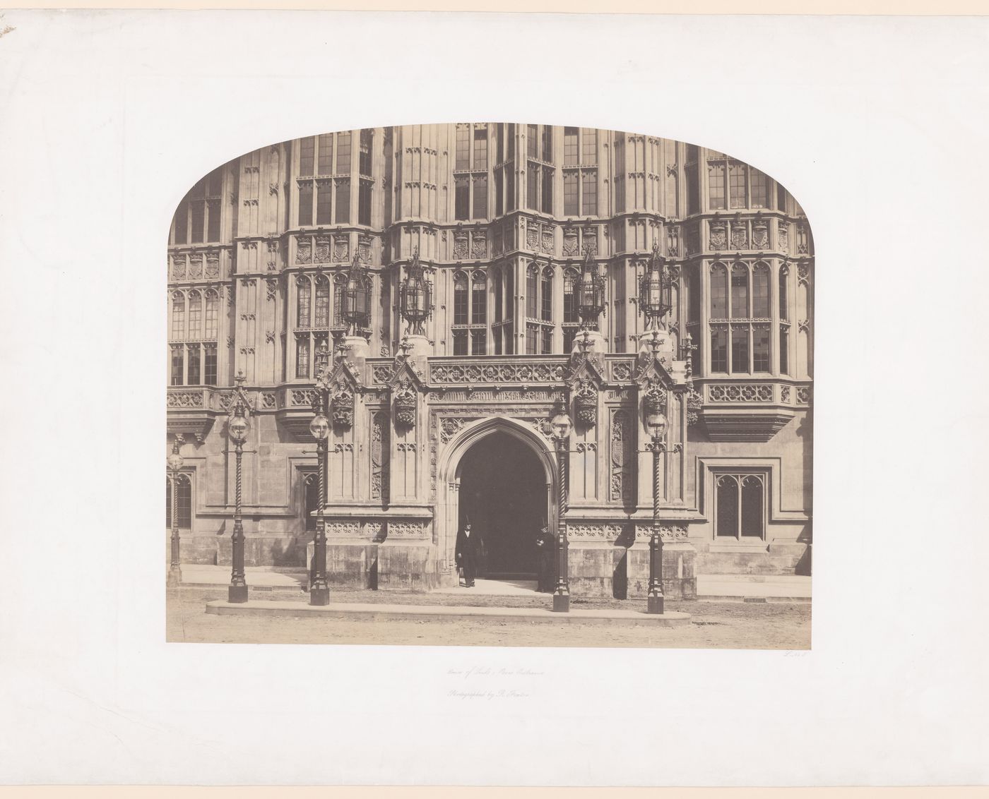 House of Lords, Peers Entrance, with two tophatted men in doorway