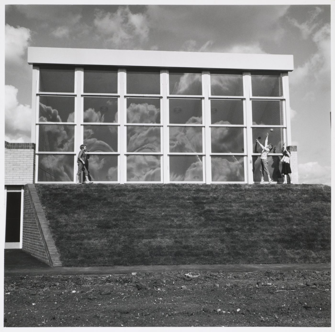 View of the Assembly Hall, Brunswick Park Primary School, London, England with James Gowan's daughters