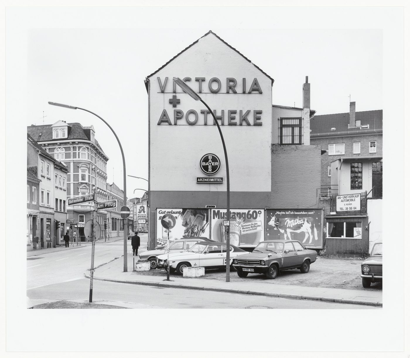 View of intersection of Bahrenfelder strasse and Am Pflug, with Victoria Apotheke at center, Hamburg, Germany
