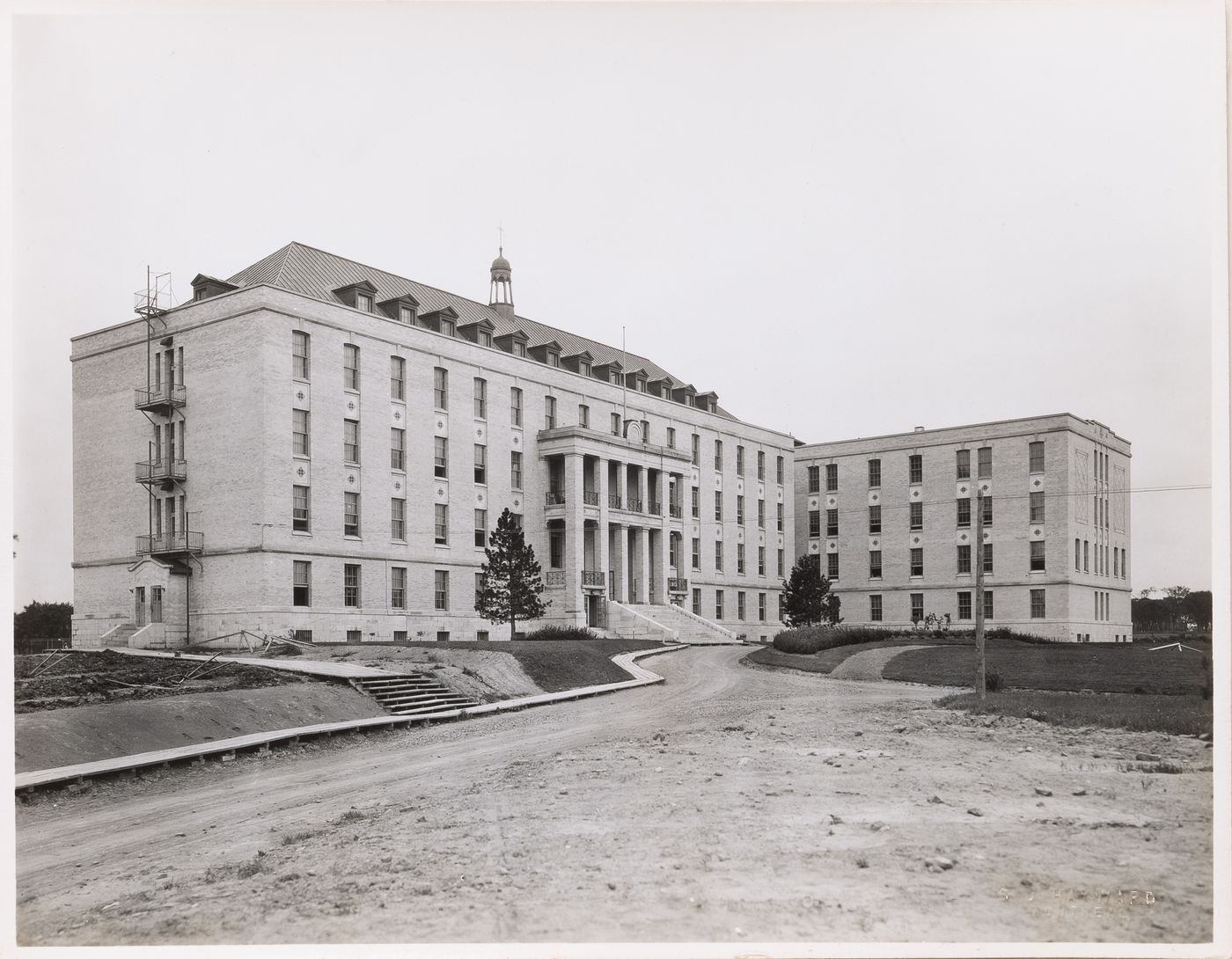 View of the principal and lateral façades of Collège Grasset, Montréal, Québec