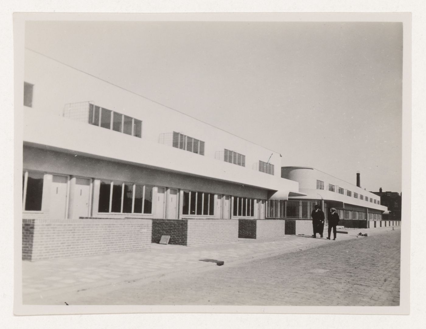 View of the principal façade of industrial row houses, Hoek van Holland, Netherlands