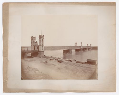 View of lattice-enclosed bridge with stone turrets, Cologne, Germany