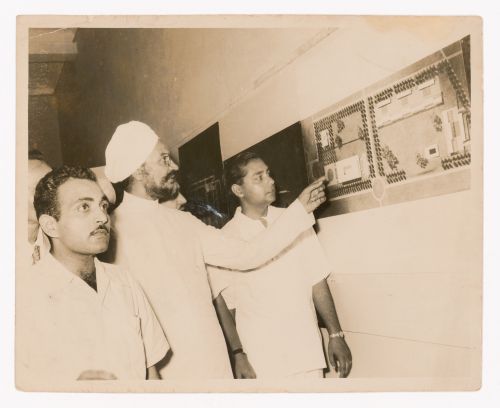 Aditya Prakash with Punjab Chief Minister Partap Singh Kairon, looking at the plan of Edward Durell Stone’s U.S. Embassy in New Delhi at an unidentified exhibition