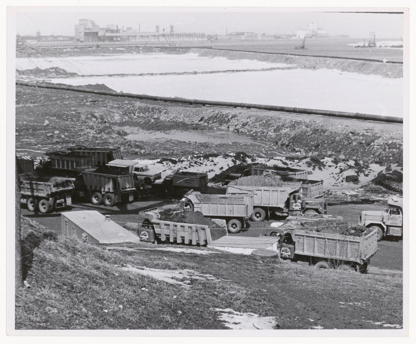 View of loaded dump trucks, Expo 67, Montréal, Québec