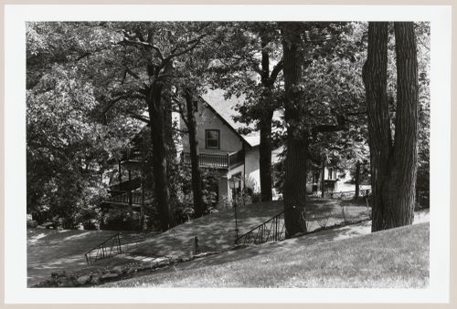View of a house from the street above, 42-46 Summit Circle, Westmount, Québec